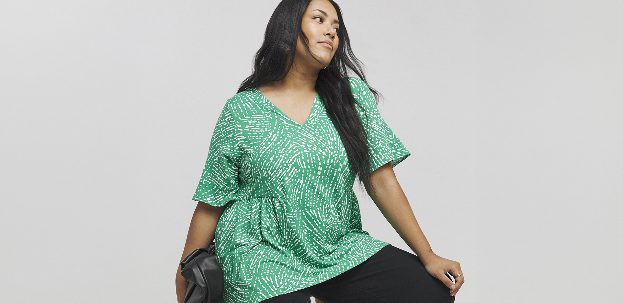 Woman wearing Green Print Supersoft V Neck Smock Top