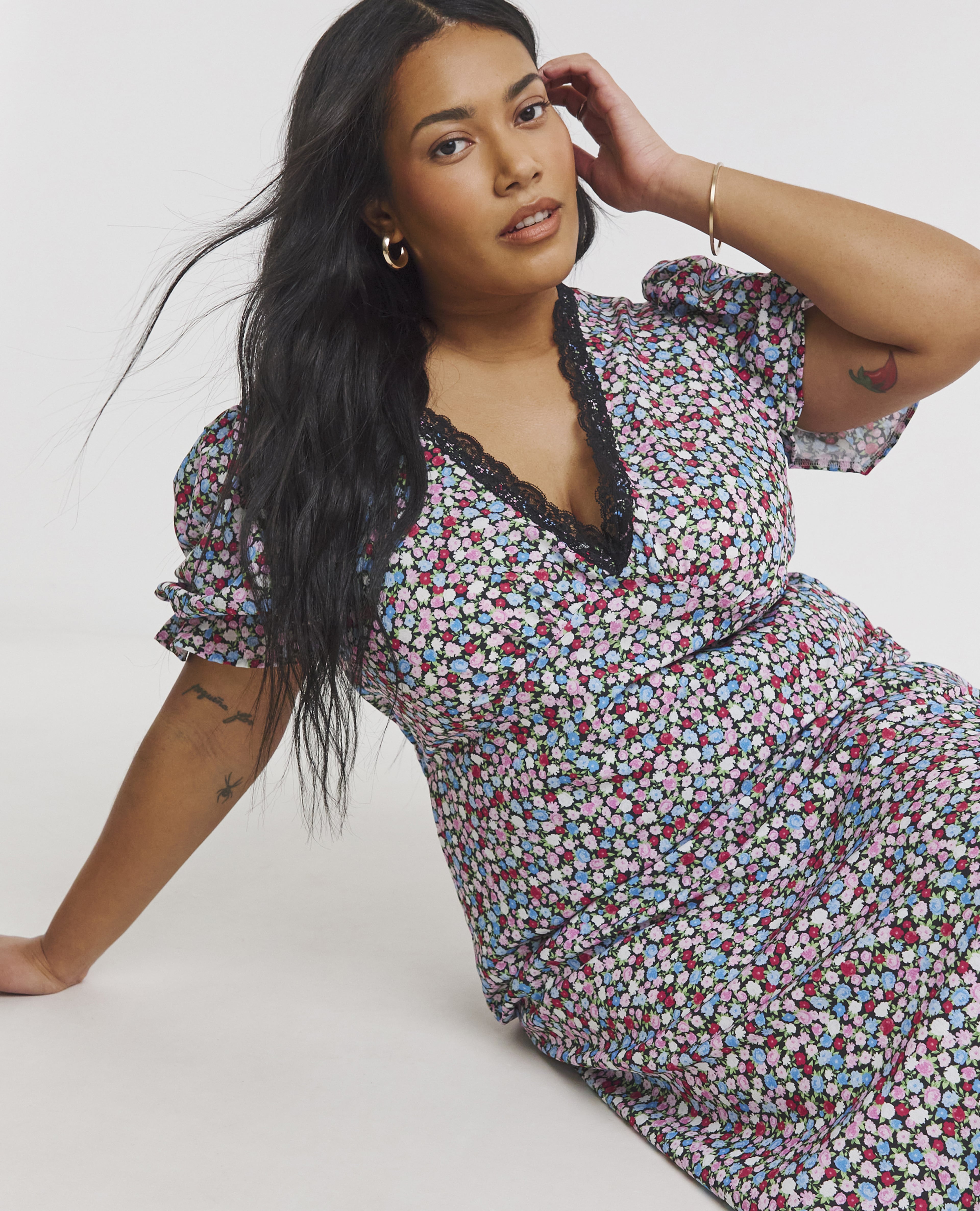 Woman wearing a petel print dress