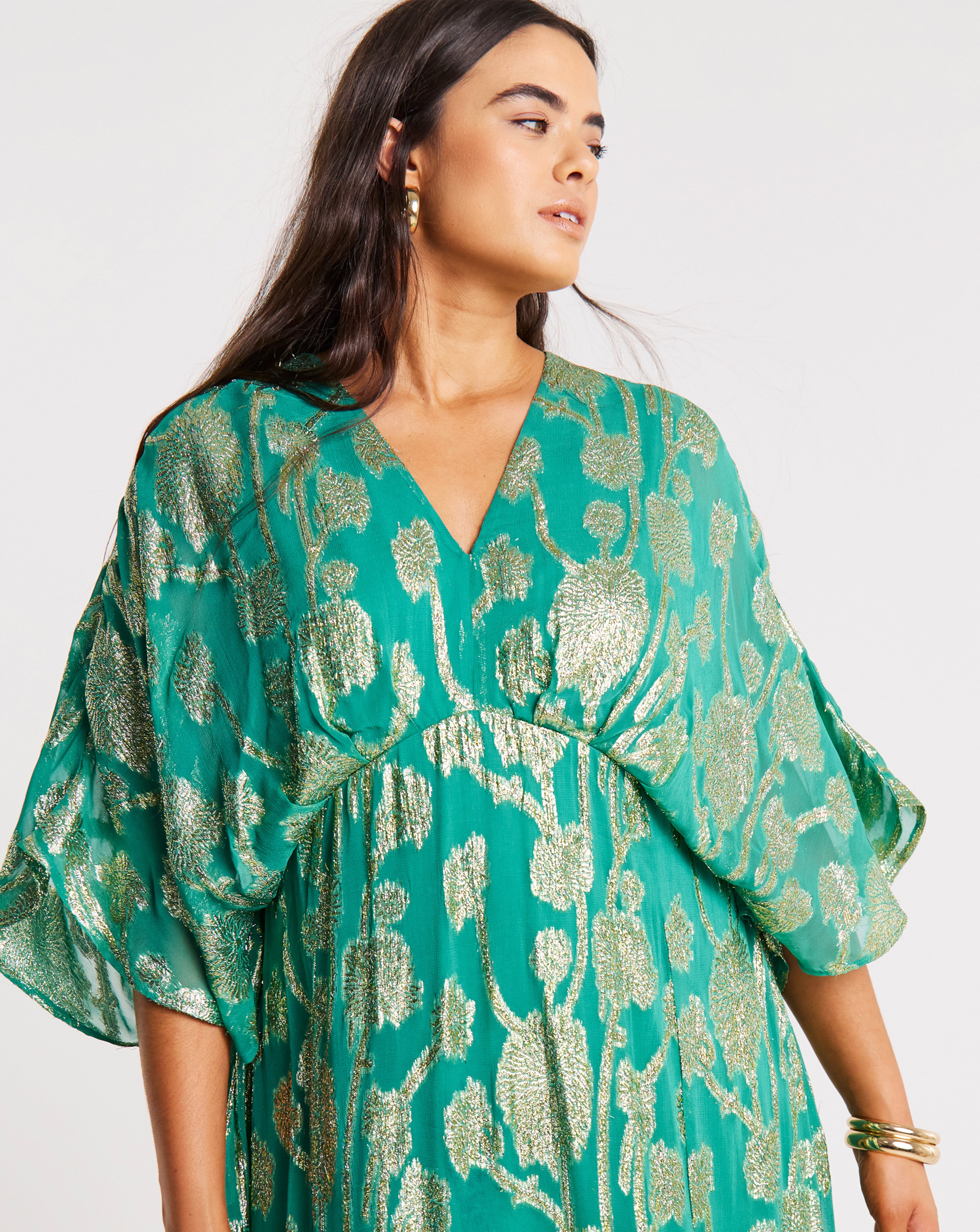 Person wearing Joanna Hope Metallic Jacquard Tea Dress in green and gold colours.