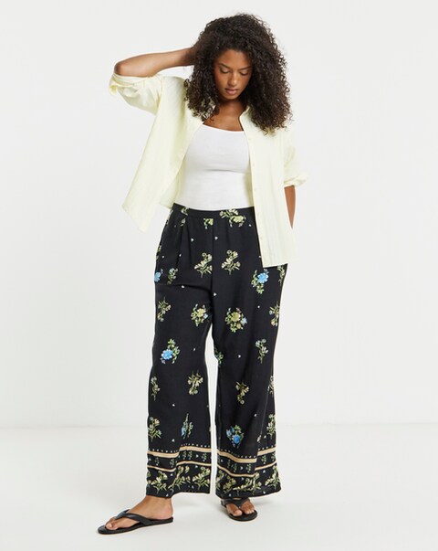 Simply Be Black Floral Border Print Wide Leg Trousers