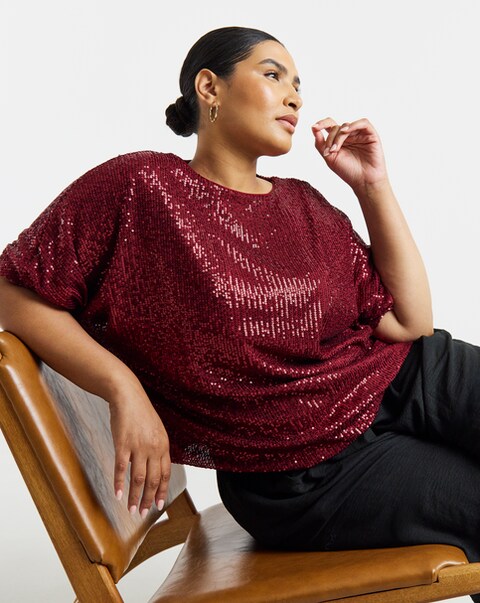 New In - Sequin Bubble Hem Top