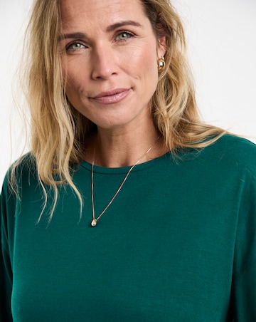 Pine Green Crew Neck Long Sleeve Dipped Back Top