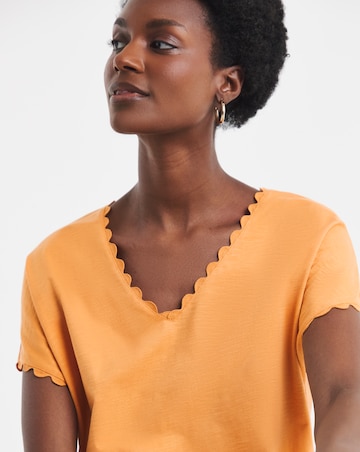 Orange Scallop V Neck Bubble Hem Top