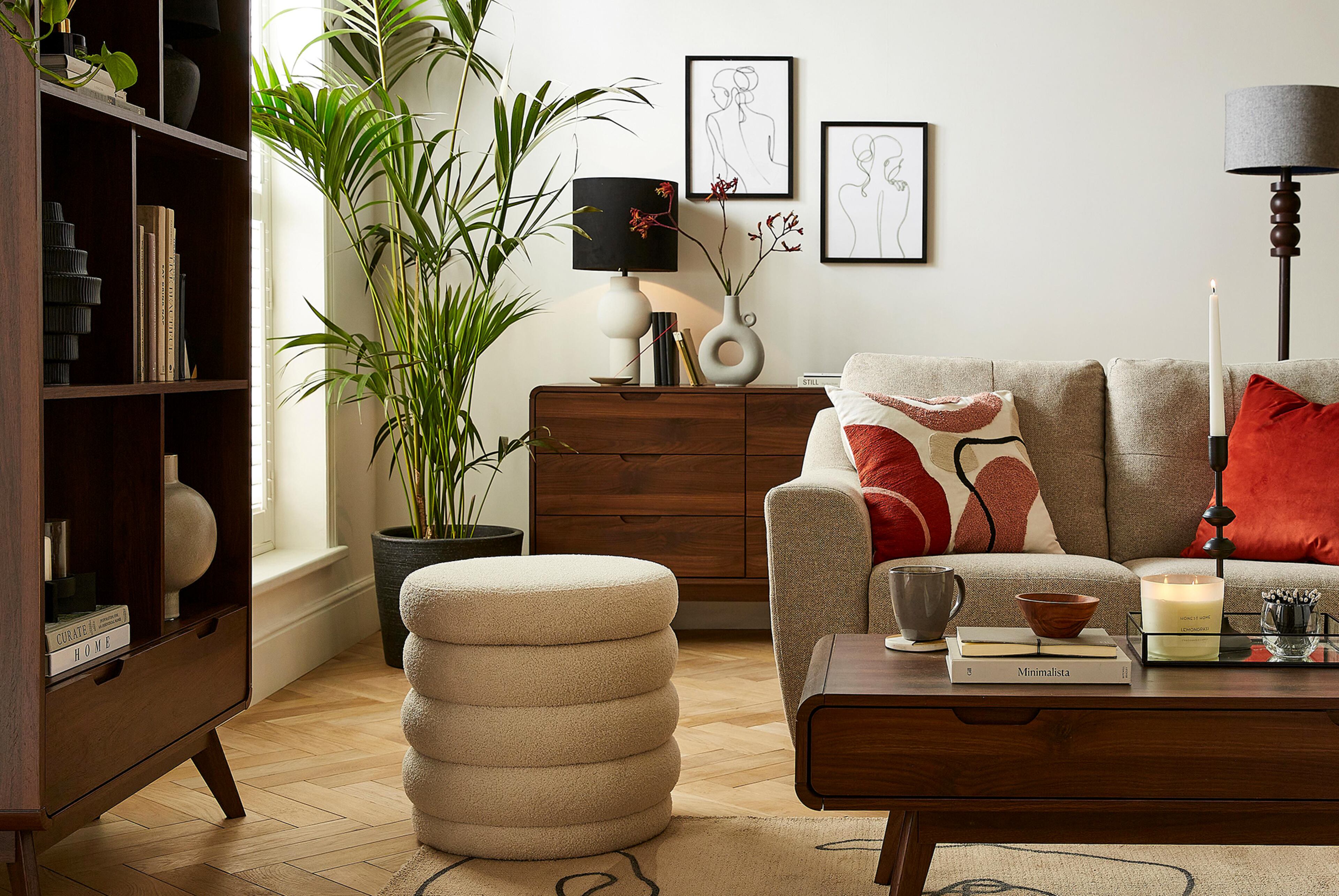 Living room with a sofa, coffee table and sideboard