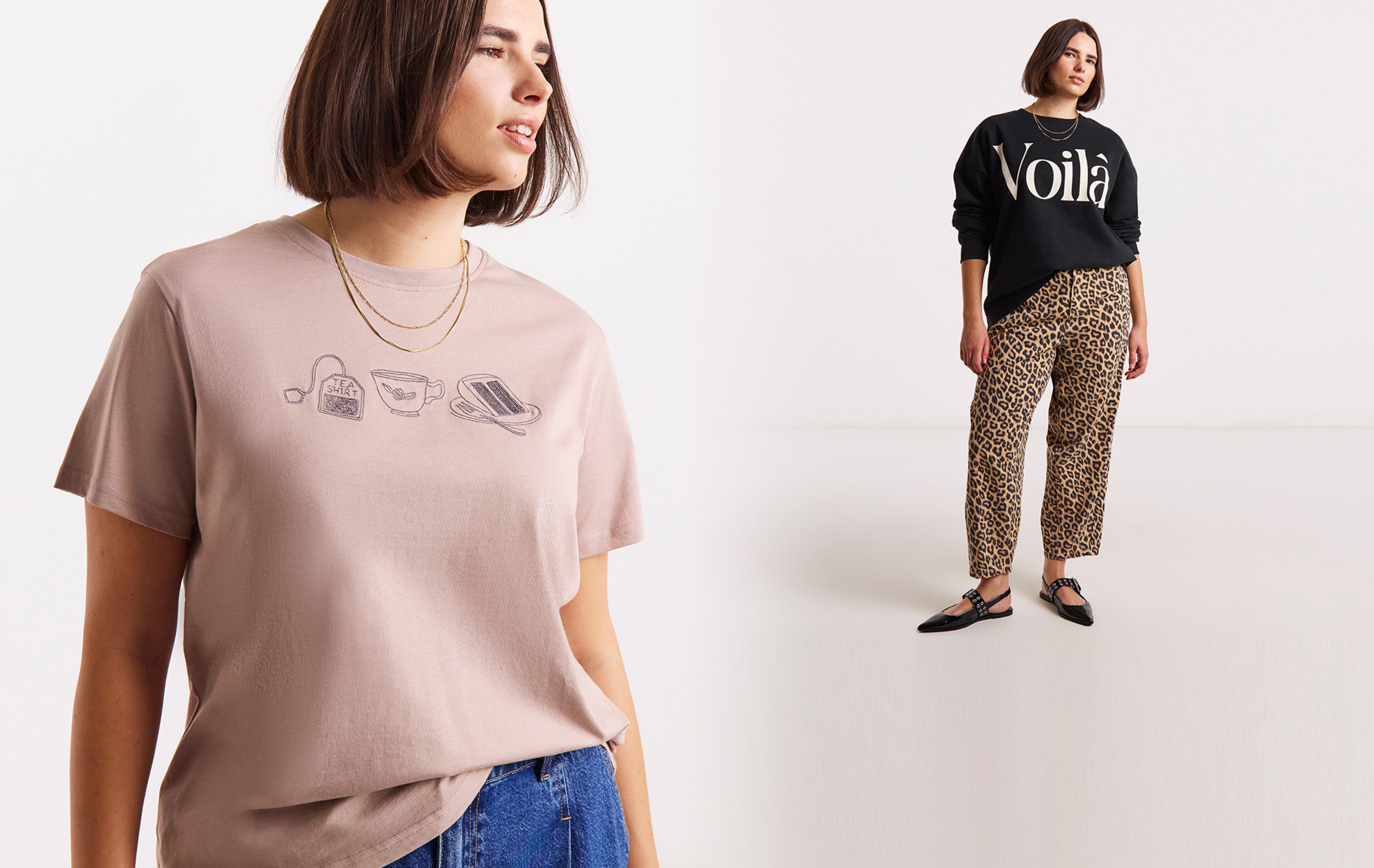 Two people wearing different outfits. One features a beige t-shirt with small line art illustrations of a handbag, teacup, and book, paired with blue jeans; the other features a black sweatshirt with the word “Voilà” in large white letters, paired with leopard-print pants and black shoes.