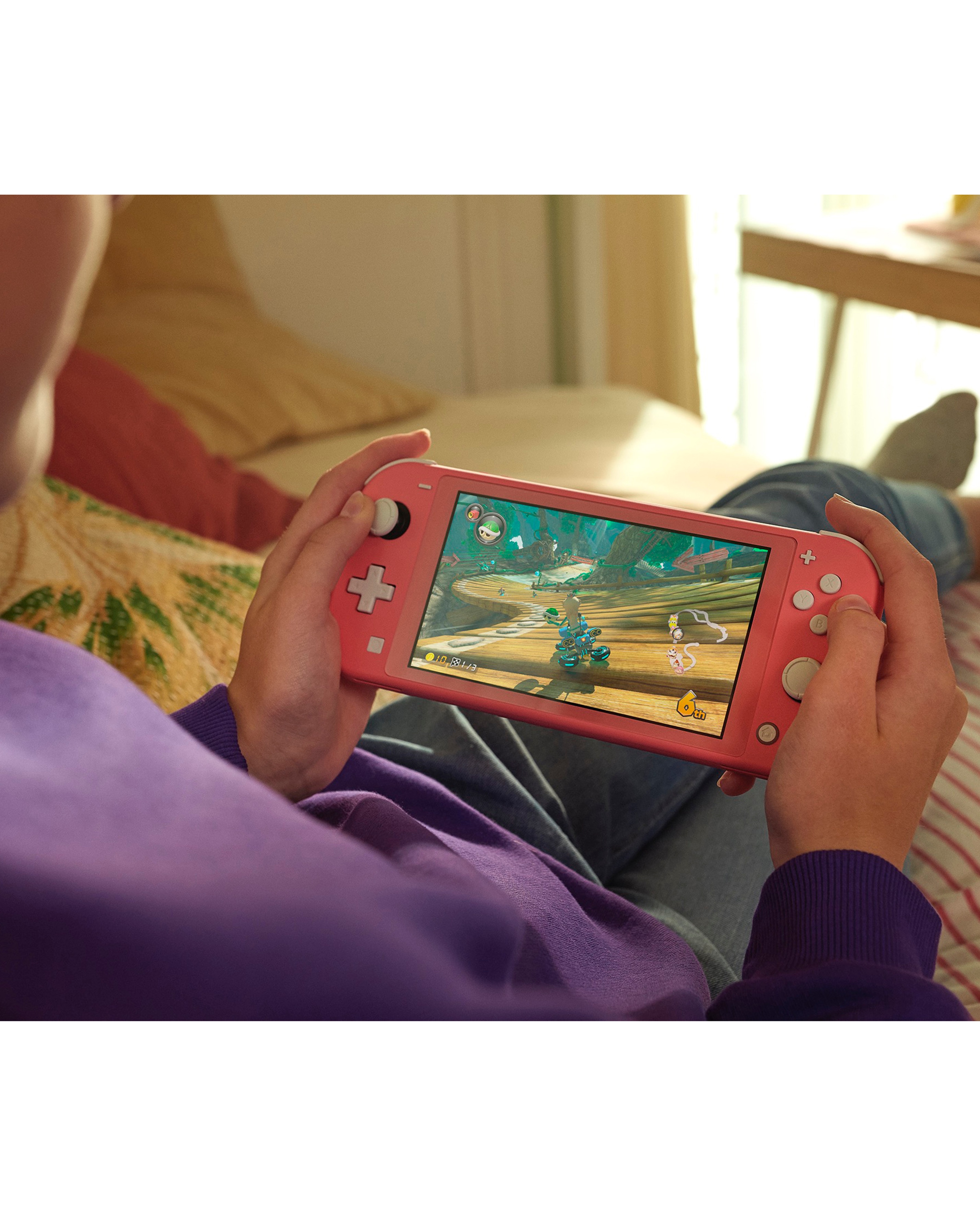 Nintendo Switch Lite Console - Coral | Fashion World Nintendo Switch Lite Console - Coral | Fashion World