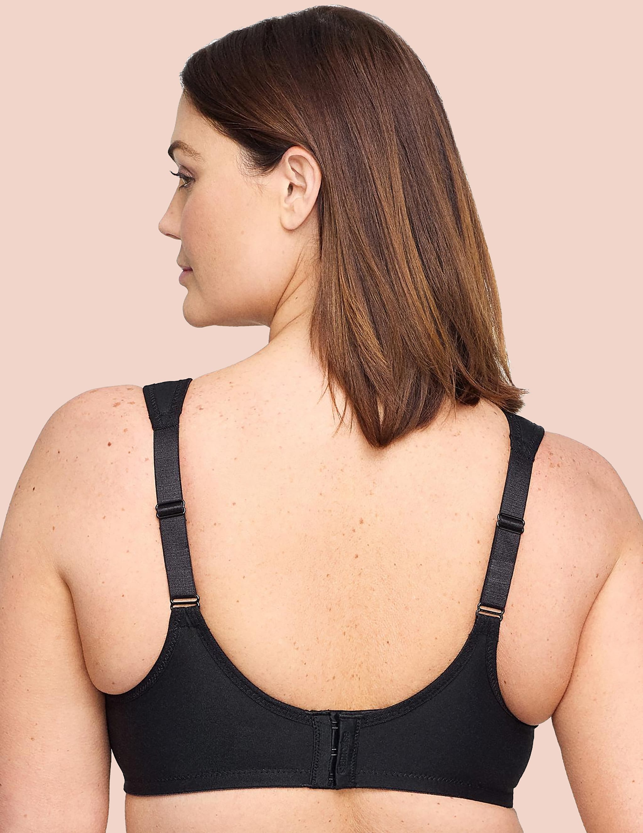 Rear view of a woman wearing black bra