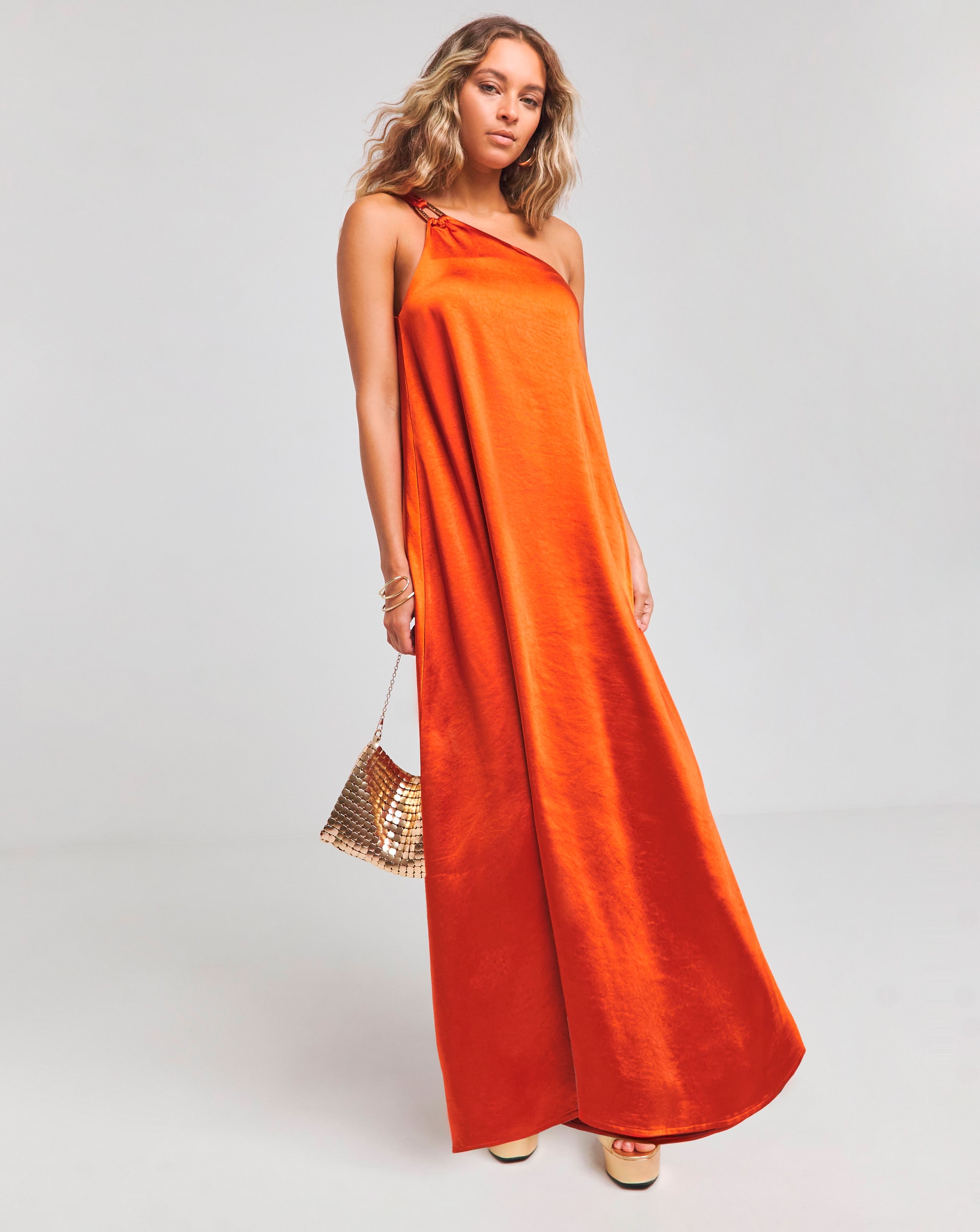 Model wearing a Burnt Orange Satin One Shoulder Maxi Dress