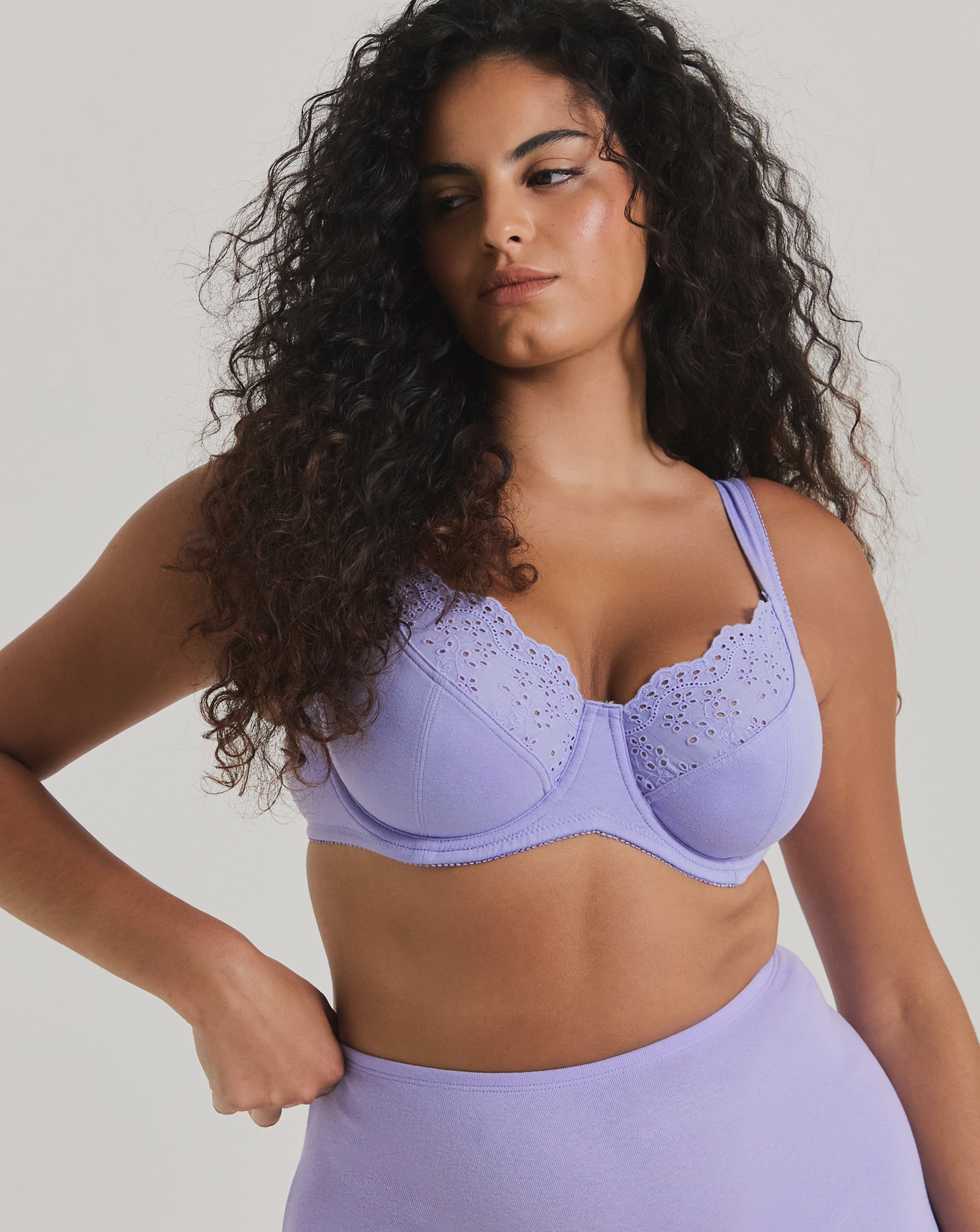 A model wearing a lilac-coloured Pretty Secrets lingerie set.