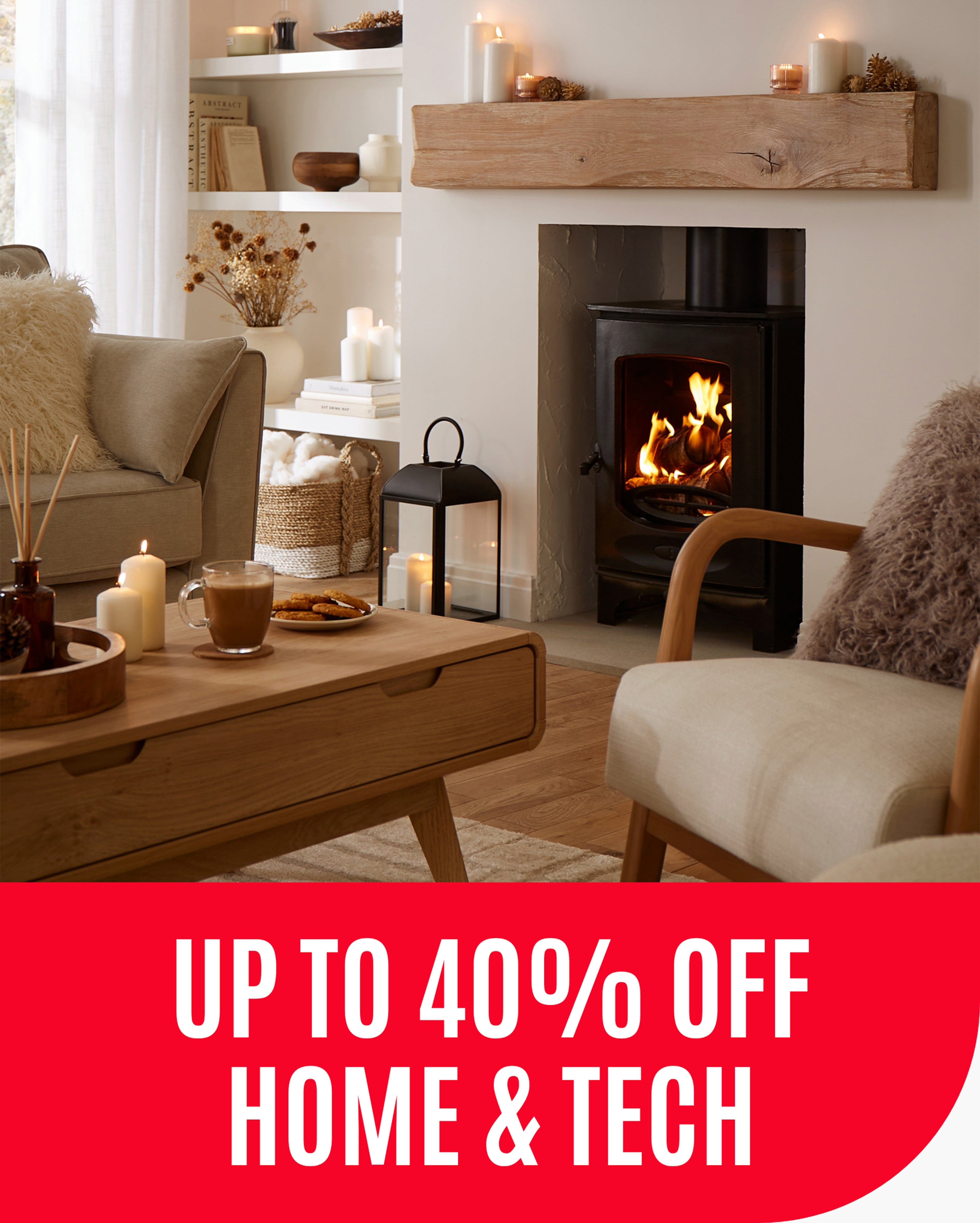 Up to 40% off home & tech, living room image showing a sofa, coffee table and accent chair