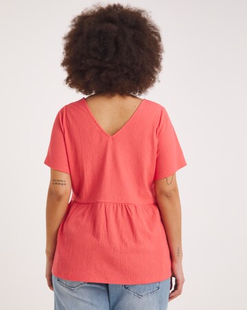 Coral Textured Peplum Top