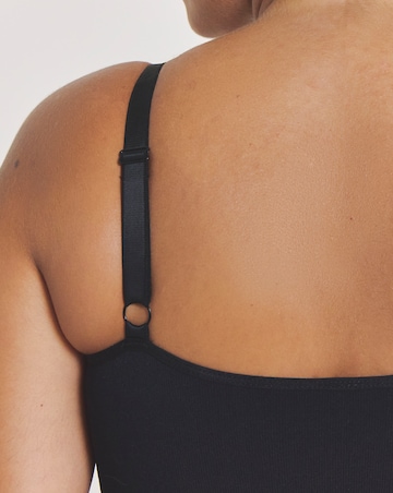 MAGISCULPT Medium Control Seamfree Mid Thigh Bodysuit Black