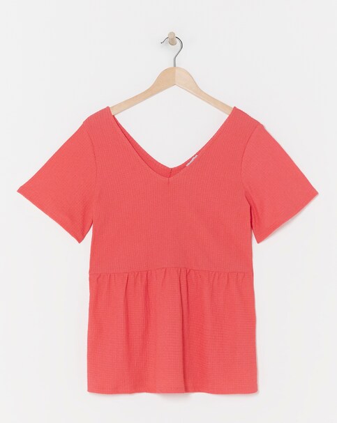 Coral Textured Peplum Top