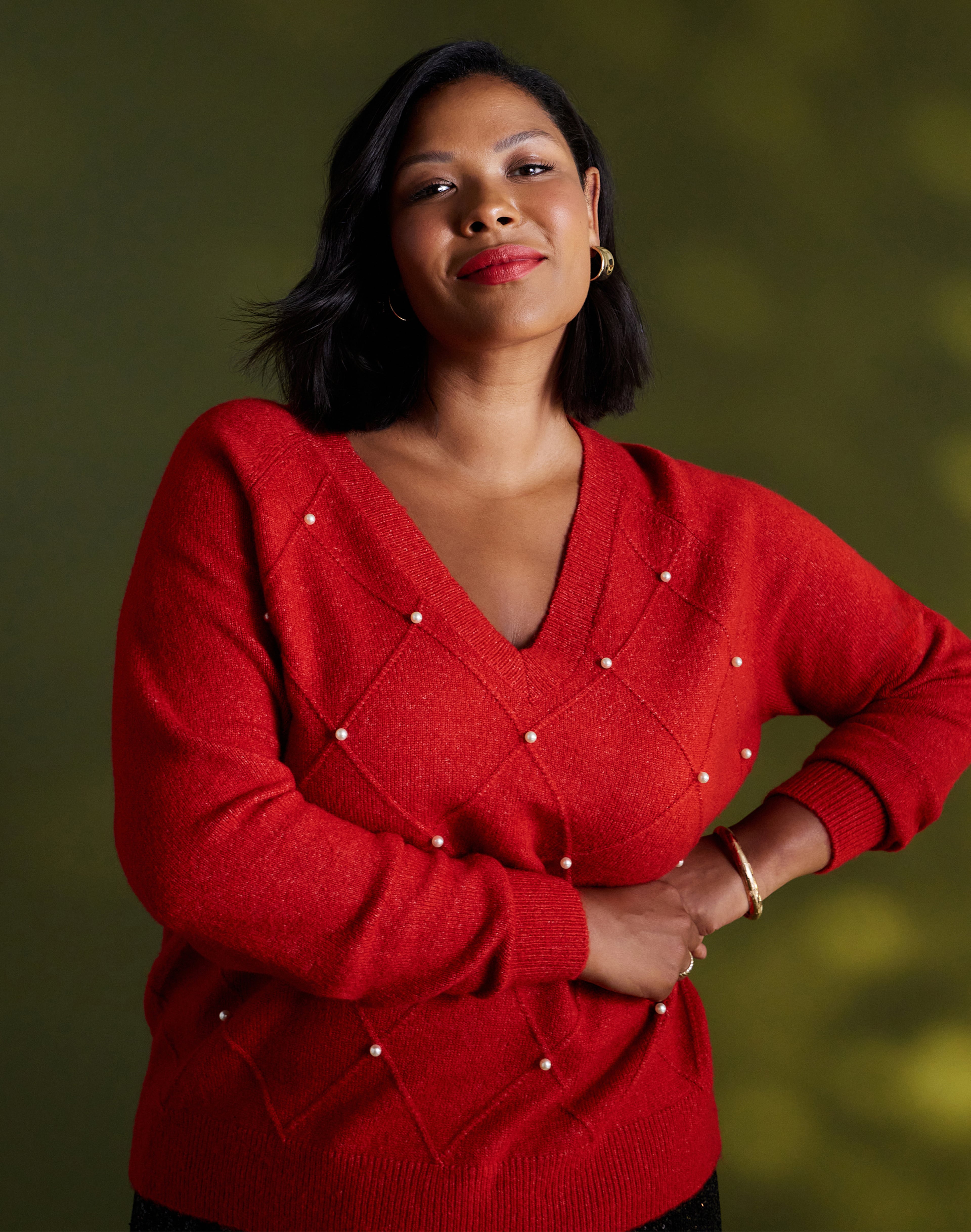 Woman in red knitted jumper