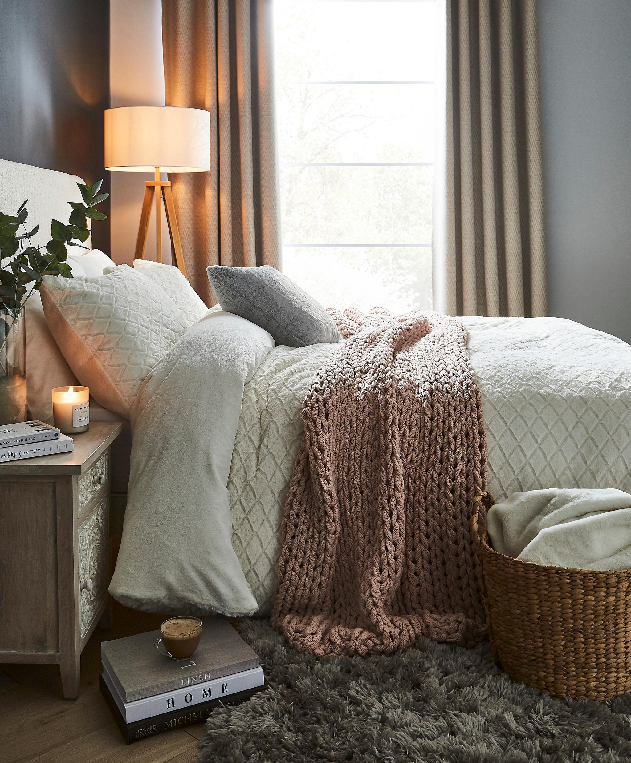 A bedroom scene showing a double bed