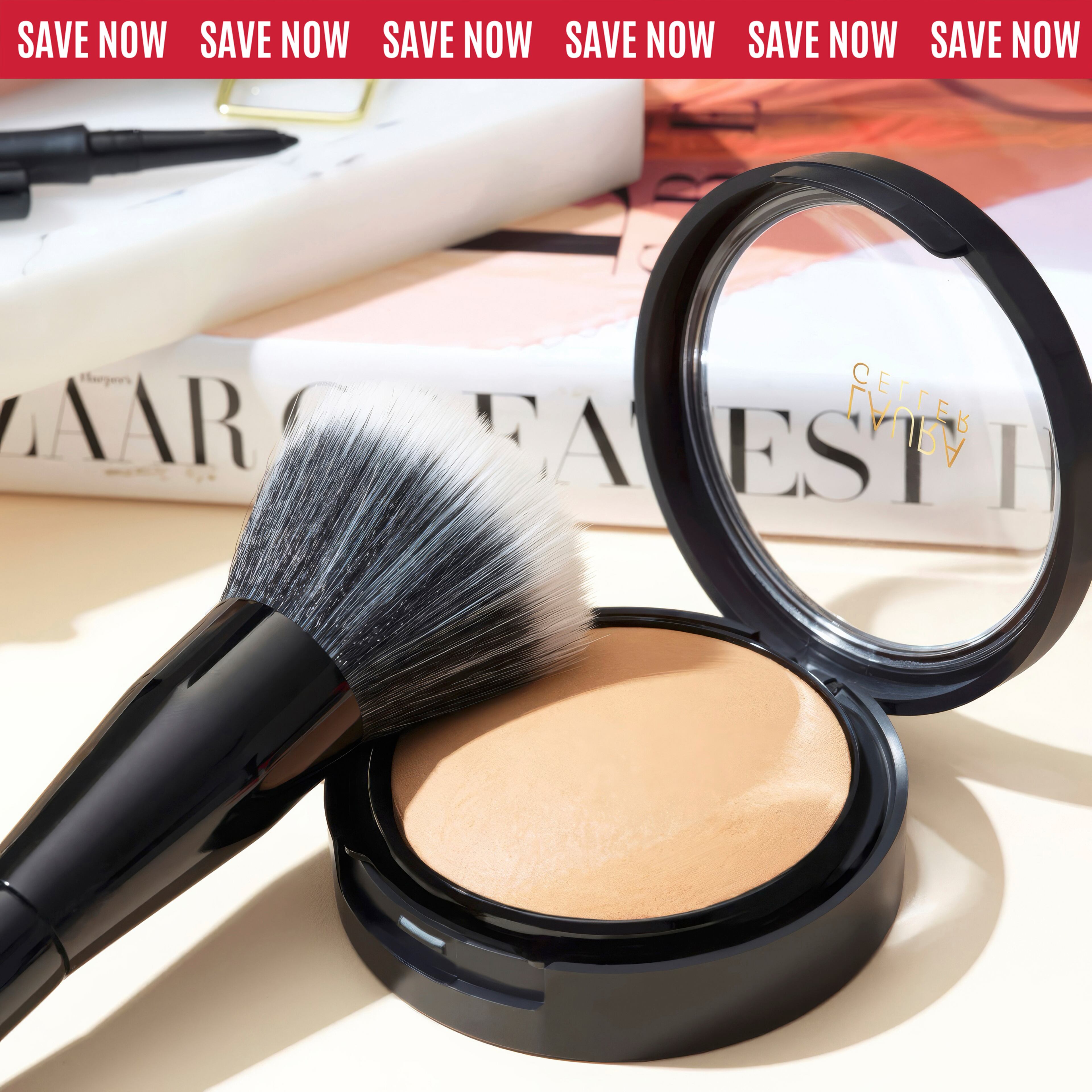 Close-up of Laura Geller makeup and a powder brush