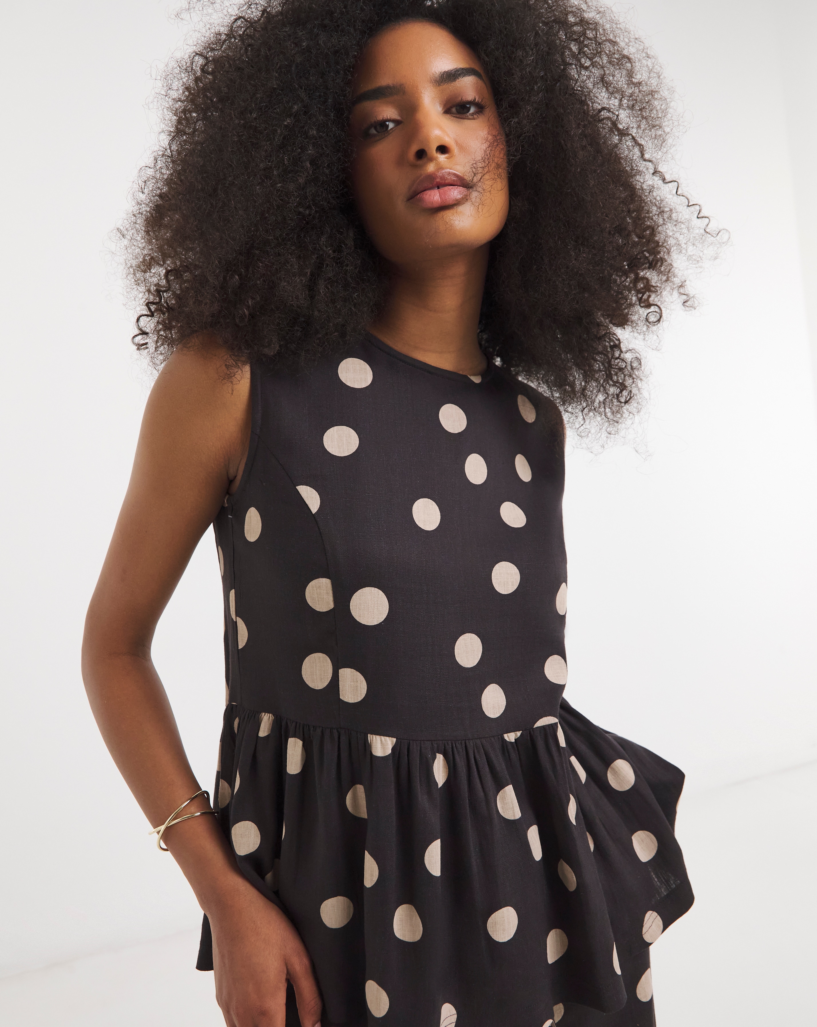 Chocolate Spot Peplum Shell Top