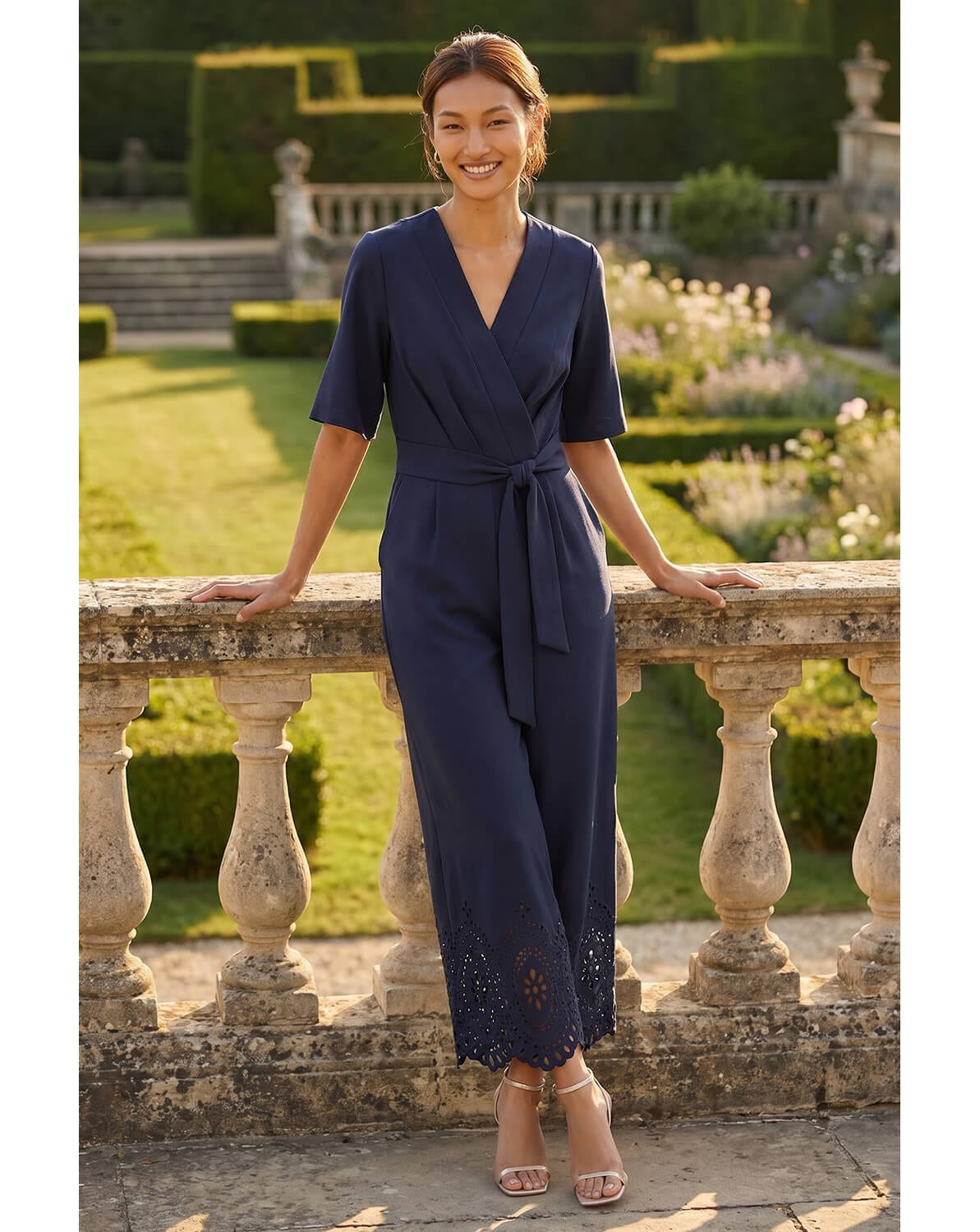 New In - Roman Laser Cut Hem Wrap Front Jumpsuit