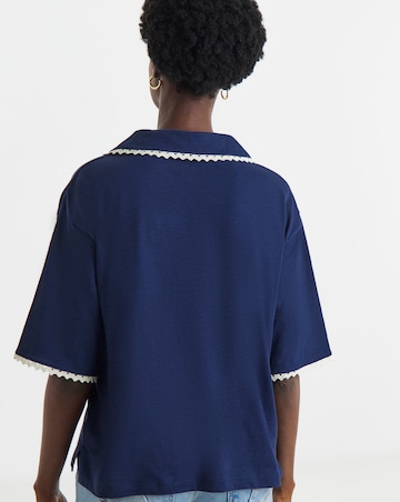 CONTRAST LACE TRIM POLO