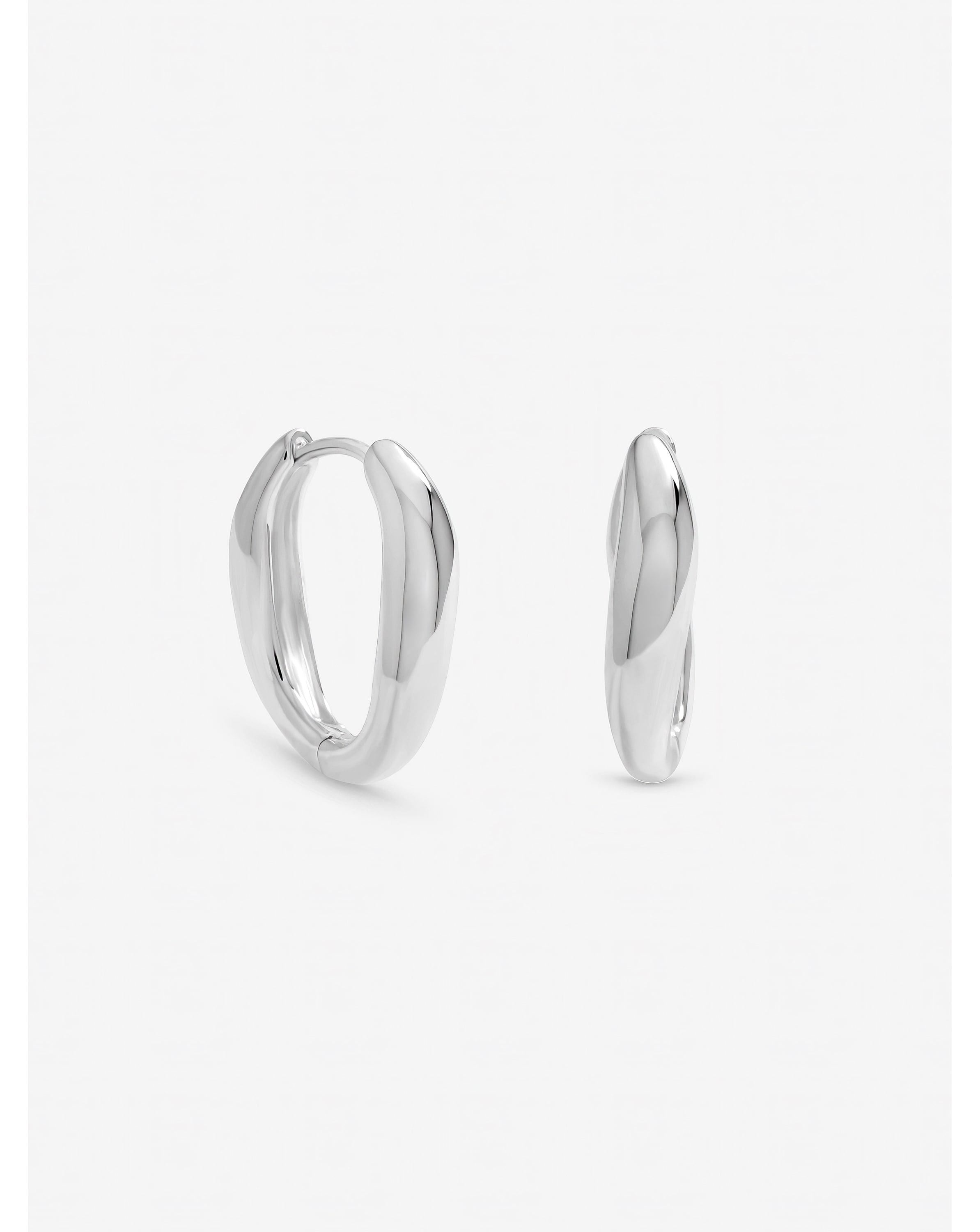 New In - Silver Plated Fluid Twist Hoops