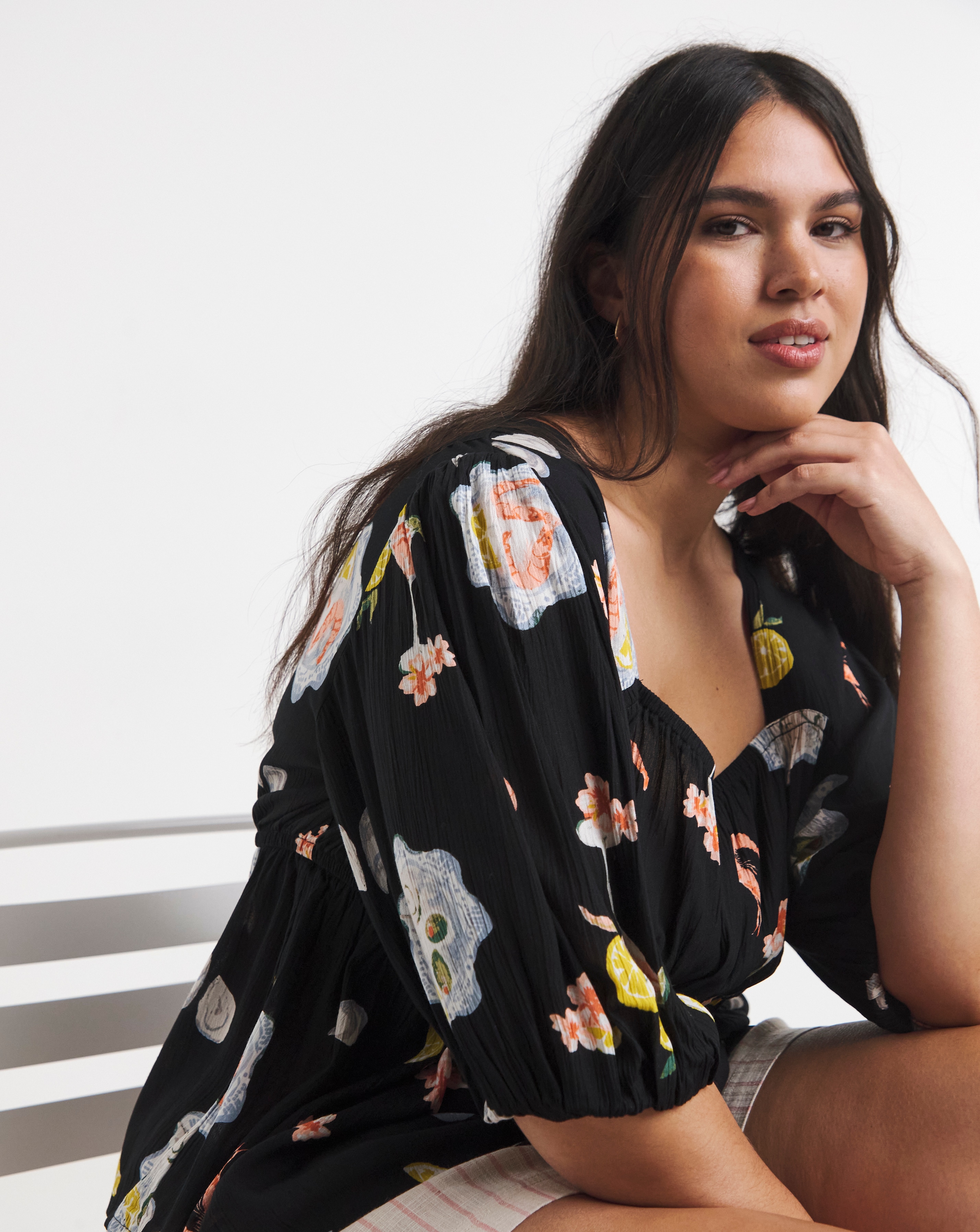 New In - Multi Print Shirred Peplum Top