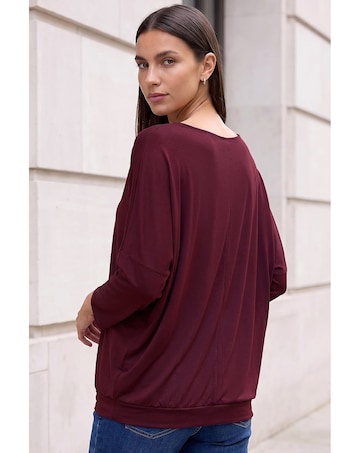 Roman Bubble Hem V-Neck Top