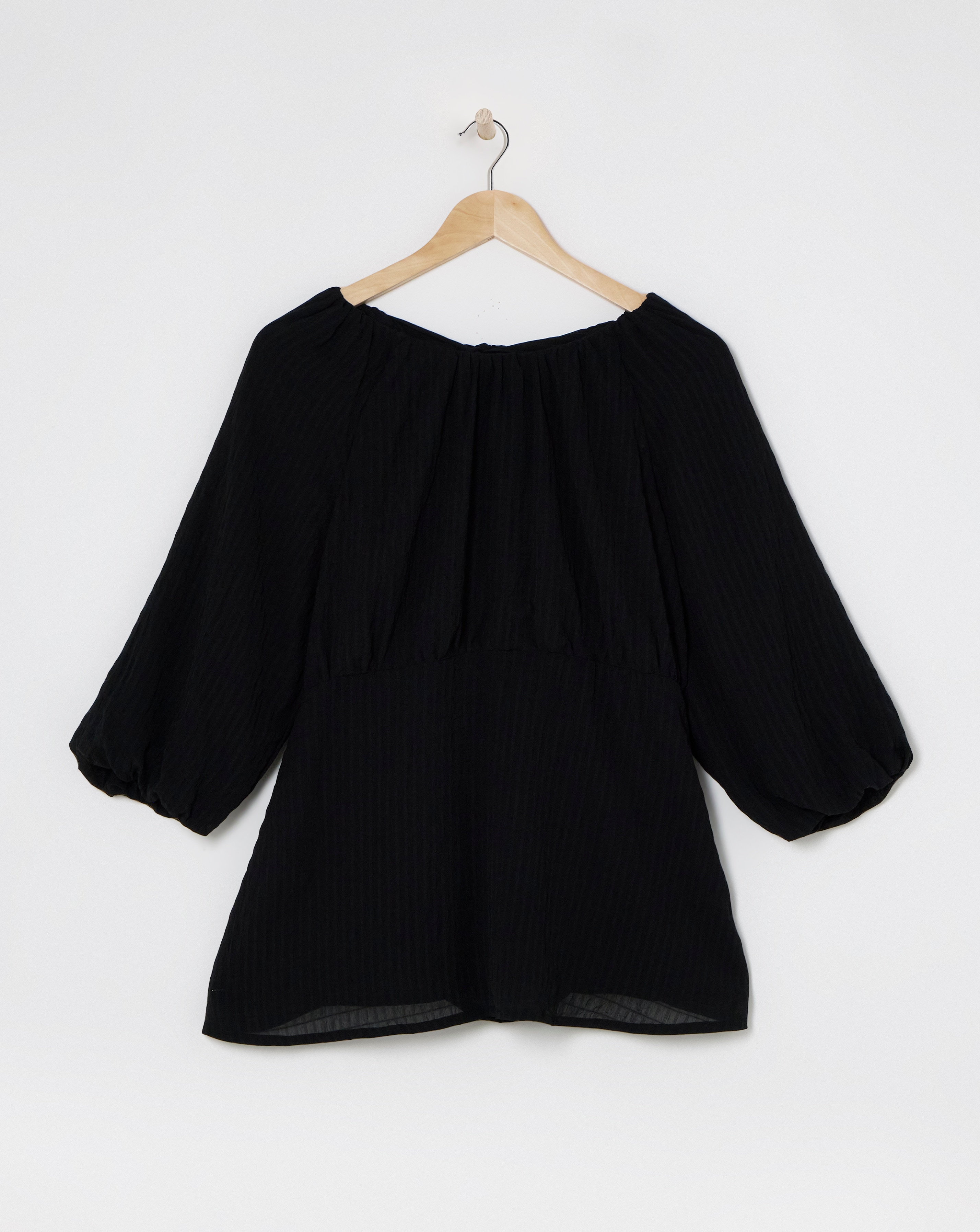 Black Exposed Back Textured Swing Top